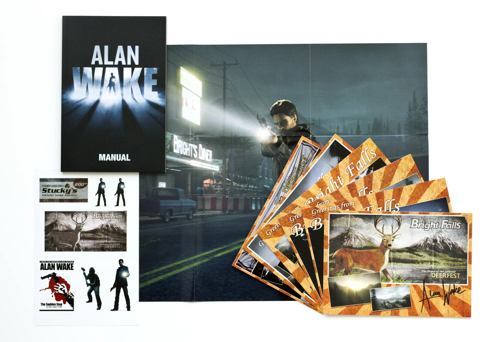 Photo of the content of Alan Wake (2012, PC, DE, Collector's Edition); developed by Remedy Entertainment Oy, published by Nordic Games GmbH; Remedy Entertainment Oy; Hi-res 3D box available at https://bigboxcollection.com