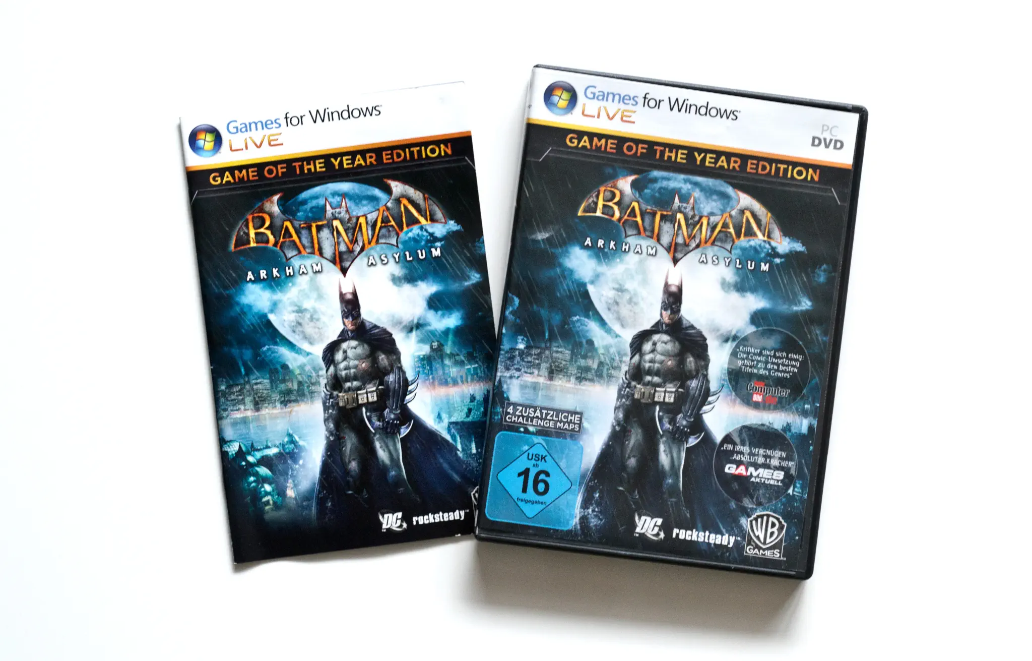 Photo of the content of Batman: Arkham Asylum (2012, PC, DE, Game of the Year Edition); developed by Rocksteady Studios Ltd, published by ak tronic Software & Services GmbH; Hi-res 3D box available at https://bigboxcollection.com