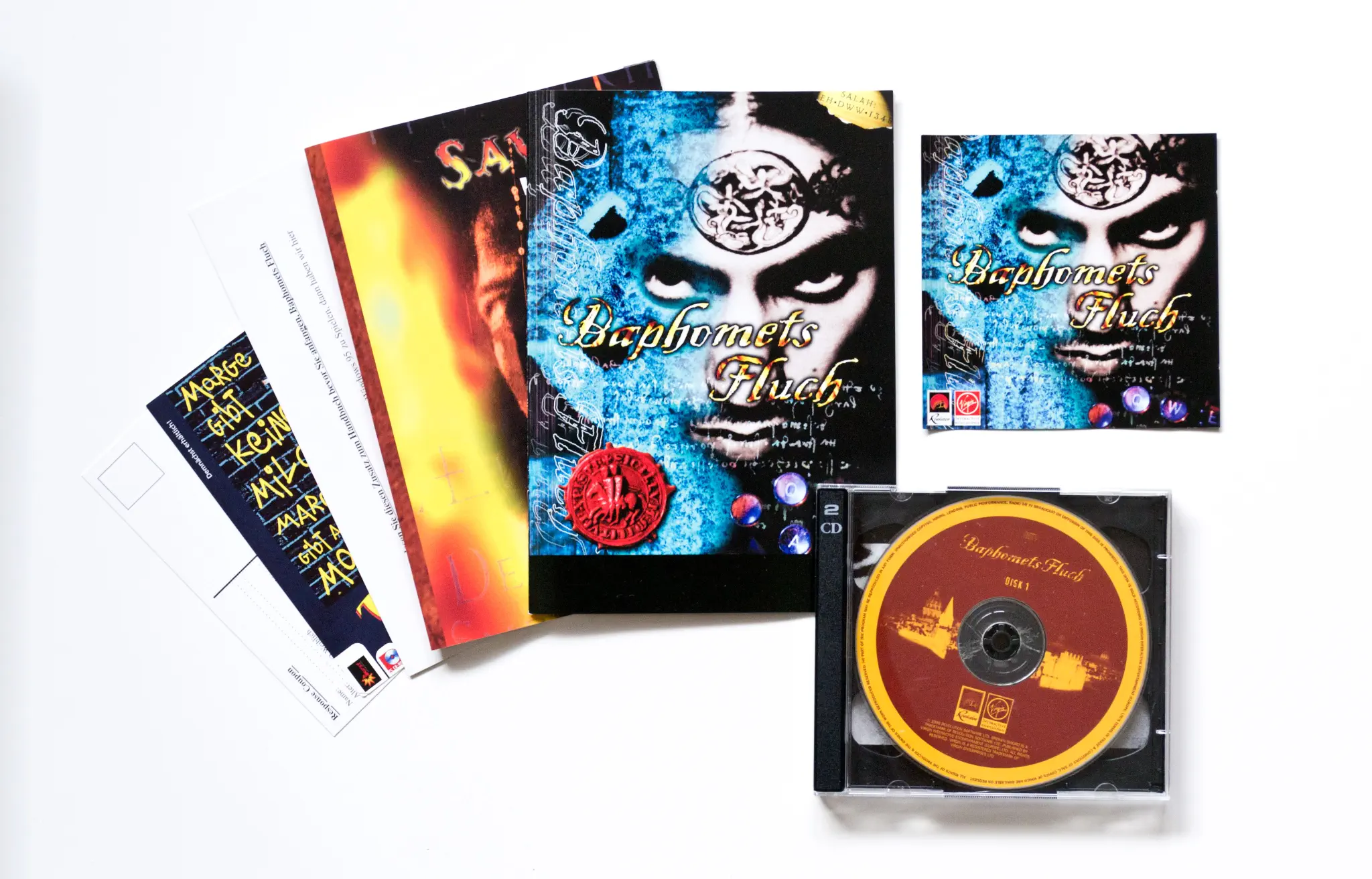Photo of the content of Broken Sword: The Shadow of the Templars (1996, PC, DE) Photo of the content of Broken Sword: The Shadow of the Templars (1996, PC, DE); developed by Revolution Software Ltd., published by Virgin Interactive Entertainment (Europe) Ltd.; Hi-res 3D box available at https://bigboxcollection.com