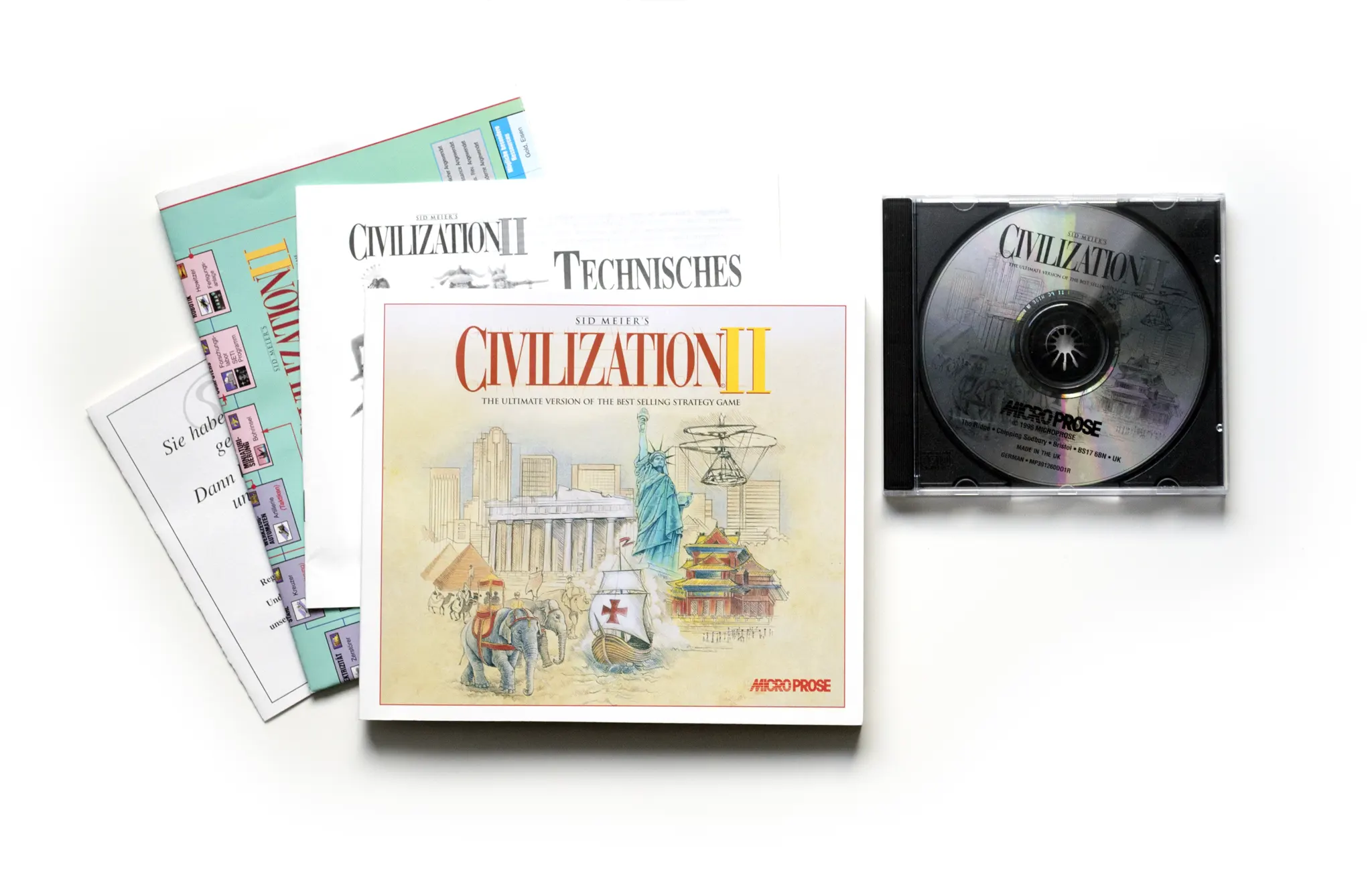 Photo of the content of Sid Meier's Civilization II (1996, PC, DE); developed by MPS Labs, published by MicroProse Software, Inc.; Hi-res 3D box available at https://bigboxcollection.com