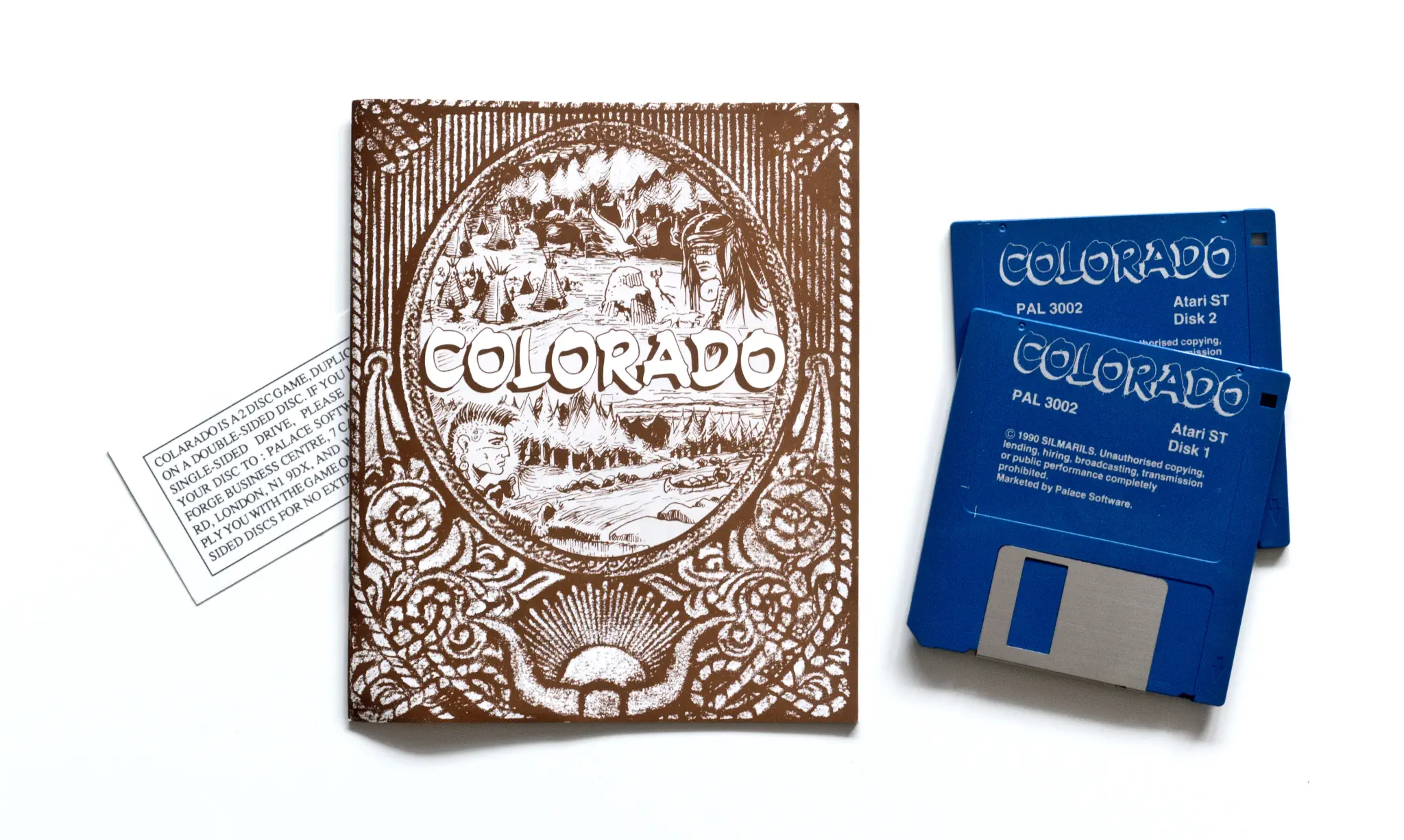 Photo of the content of Colorado (1990, Atari ST, EU) Photo of the content of Colorado (1990, Atari ST, EU); developed by Silmarils, published by Silmarils; Hi-res 3D box available at https://bigboxcollection.com