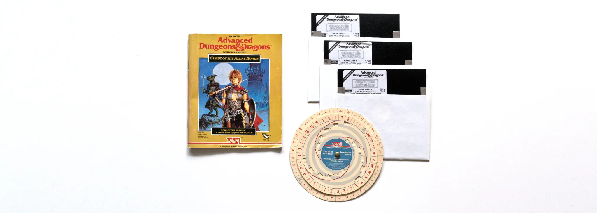 Photo of the content of Curse of the Azure Bonds (1989, C64, FR) Photo of the content of Curse of the Azure Bonds (1989, C64, FR); developed by Strategic Simulations, Inc., published by U.S. Gold Ltd.; Hi-res 3D box available at https://bigboxcollection.com