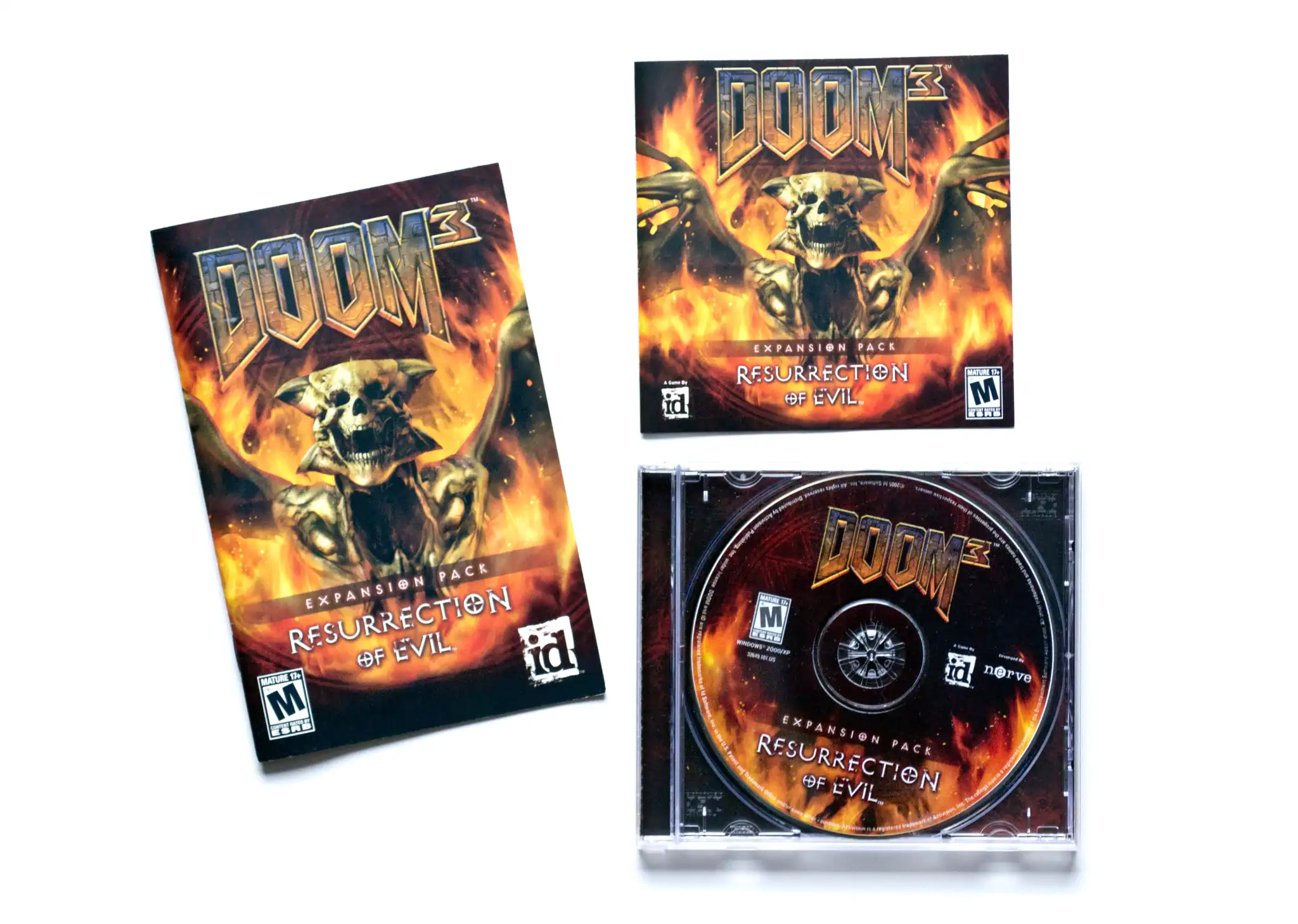 Photo of the content of Doom³: Resurrection of Evil (2005, PC, US) Photo of the content of Doom³: Resurrection of Evil (2005, PC, US); developed by Nerve Software, LLC, published by Activision Publishing, Inc.; Hi-res 3D box available at https://bigboxcollection.com