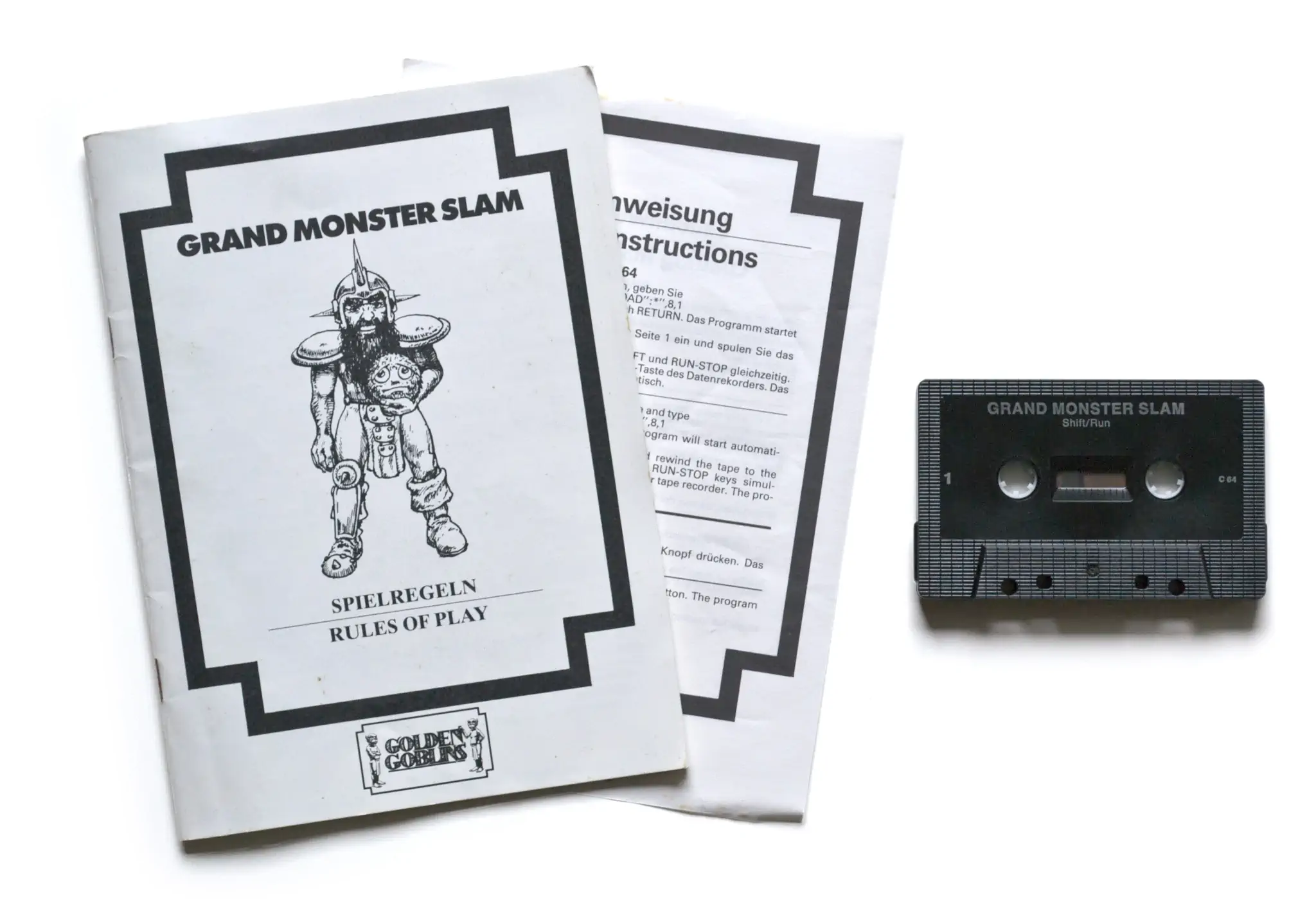 Photo of the content of Grand Monster Slam (1989, C64, DE); developed by Golden Goblins, published by Rainbow Arts Software GmbH; Hi-res 3D box available at https://bigboxcollection.com