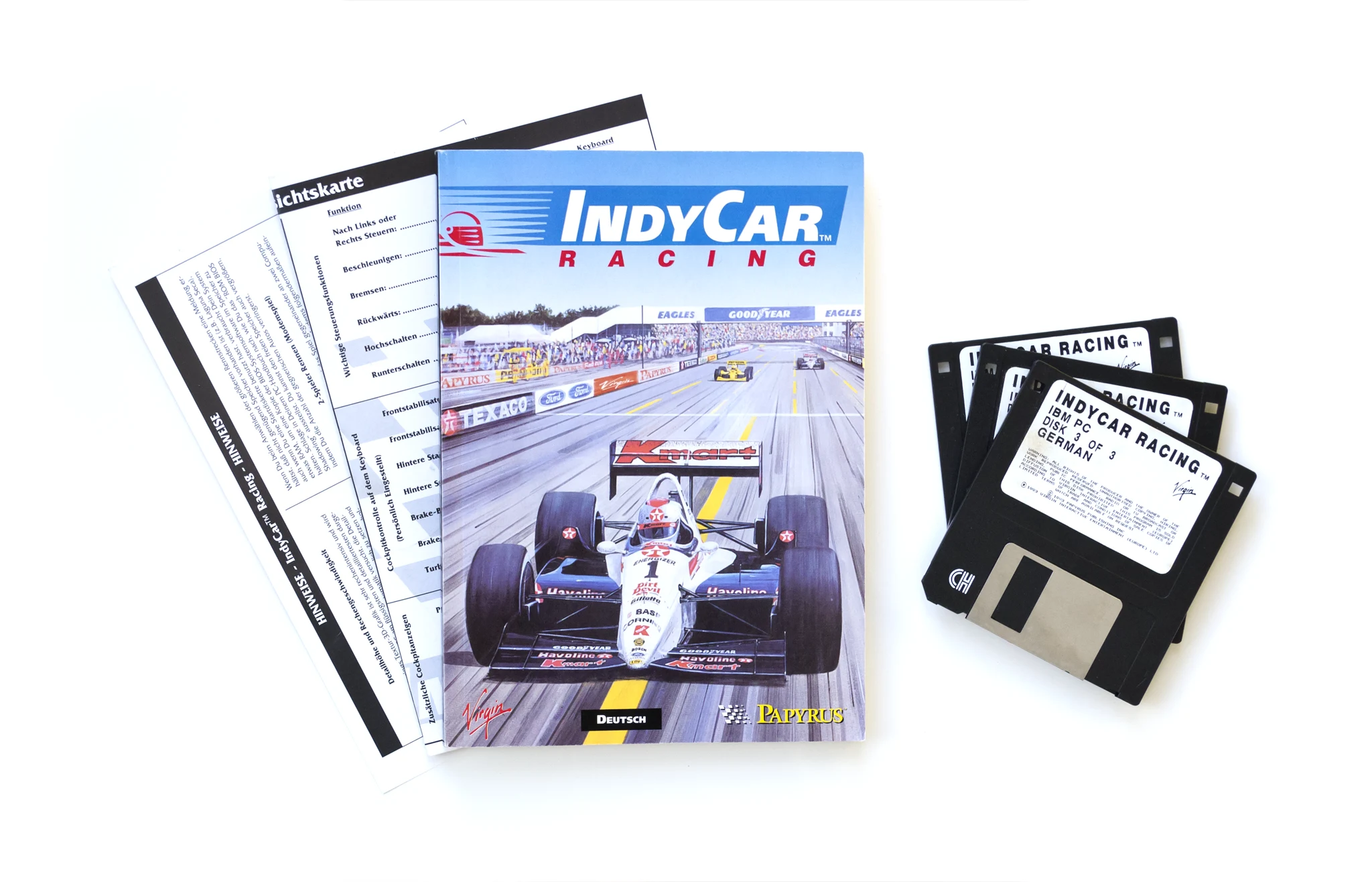 Photo of the content of IndyCar Racing (1993, PC, DE); developed by Papyrus Design Group, Inc., published by Virgin Interactive Entertainment (Europe) Ltd.; Hi-res 3D box available at https://bigboxcollection.com