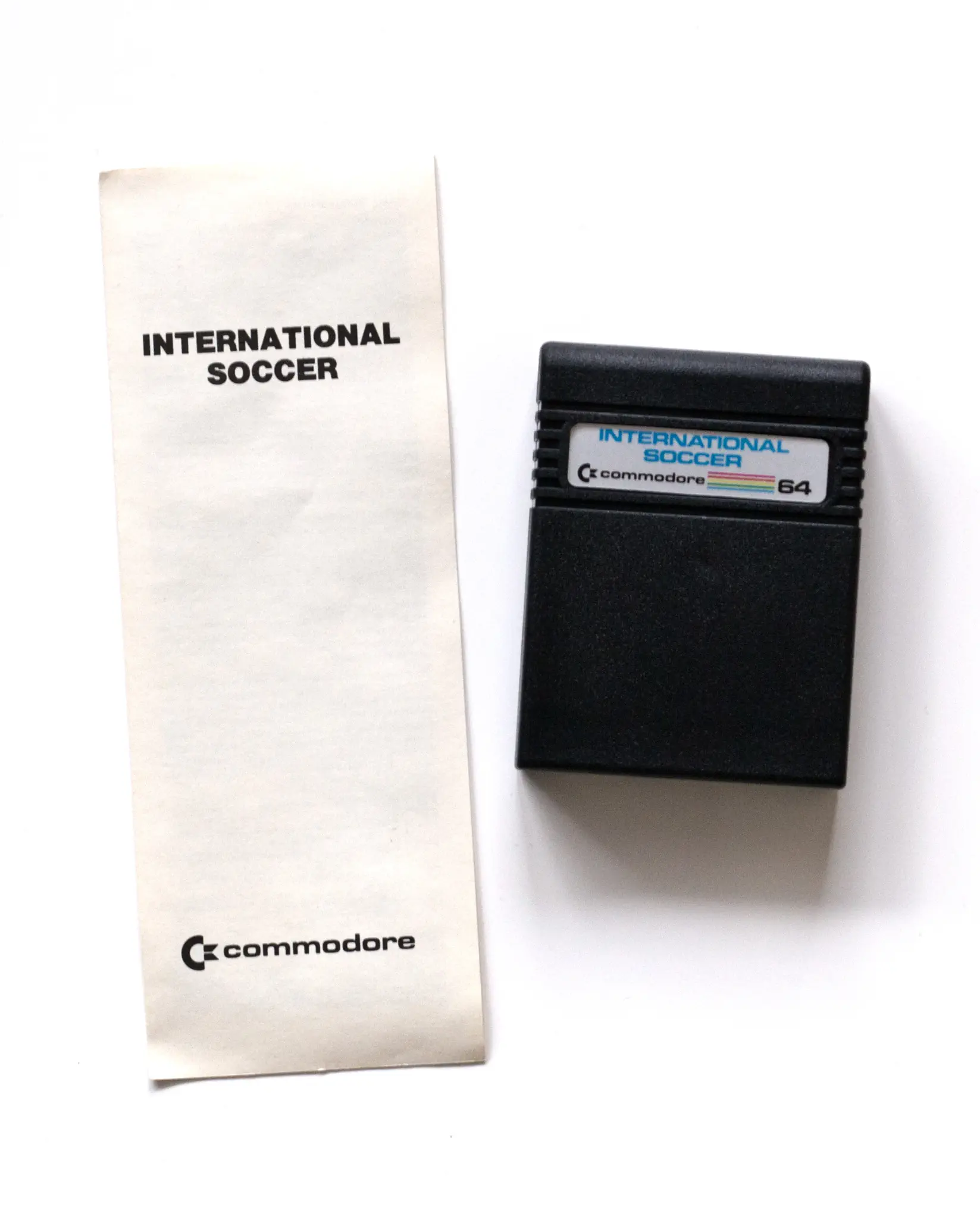 Photo of the content of International Soccer (1983, C64, US); developed by Andrew Spencer, published by Commodore Business Machines, Inc; Hi-res 3D box available at https://bigboxcollection.com