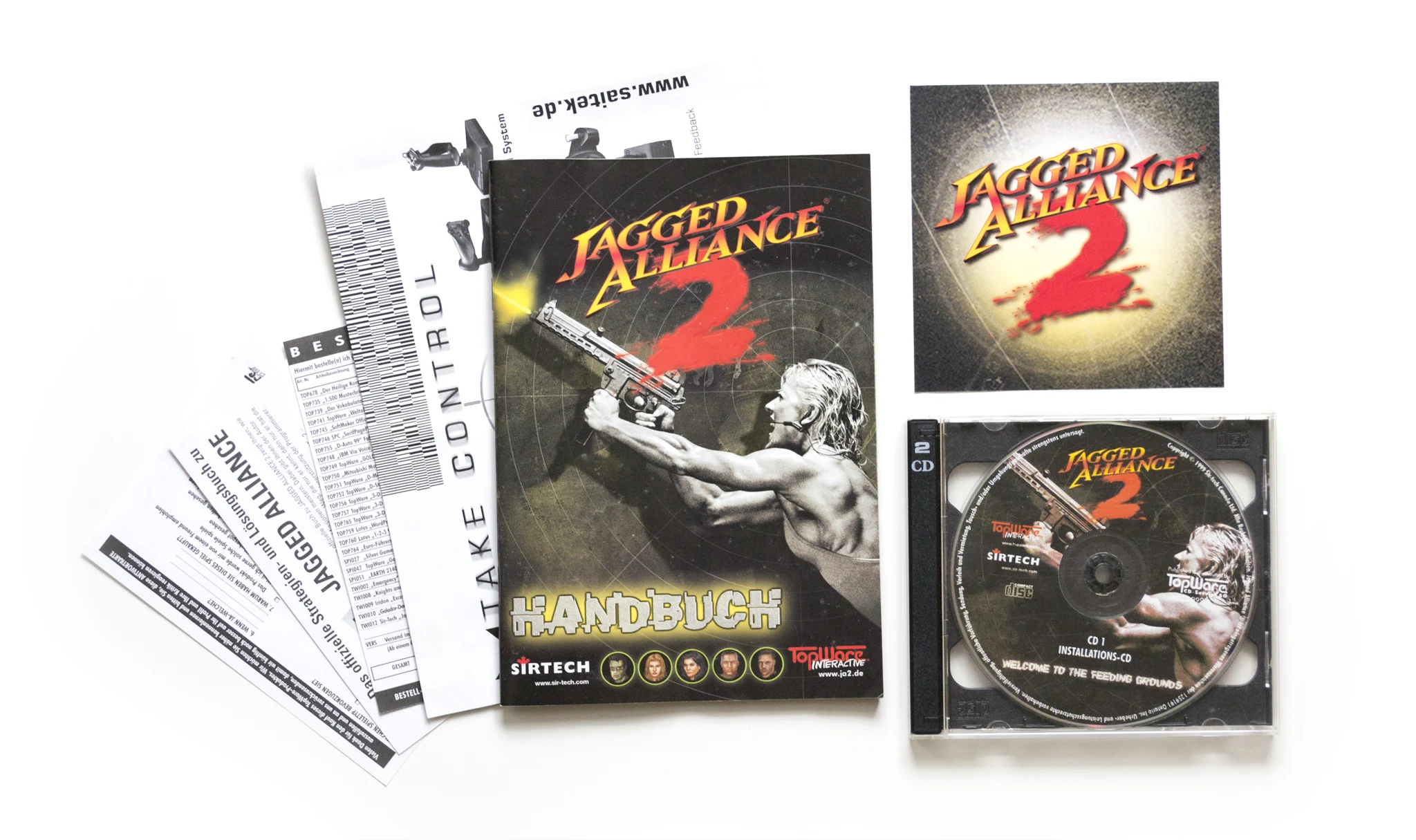 Photo of the content of Jagged Alliance 2 (1999, PC, DE) Photo of the content of Jagged Alliance 2 (1999, PC, DE); developed by Sirtech Canada Ltd., published by TopWare CD-Service AG; Hi-res 3D box available at https://bigboxcollection.com