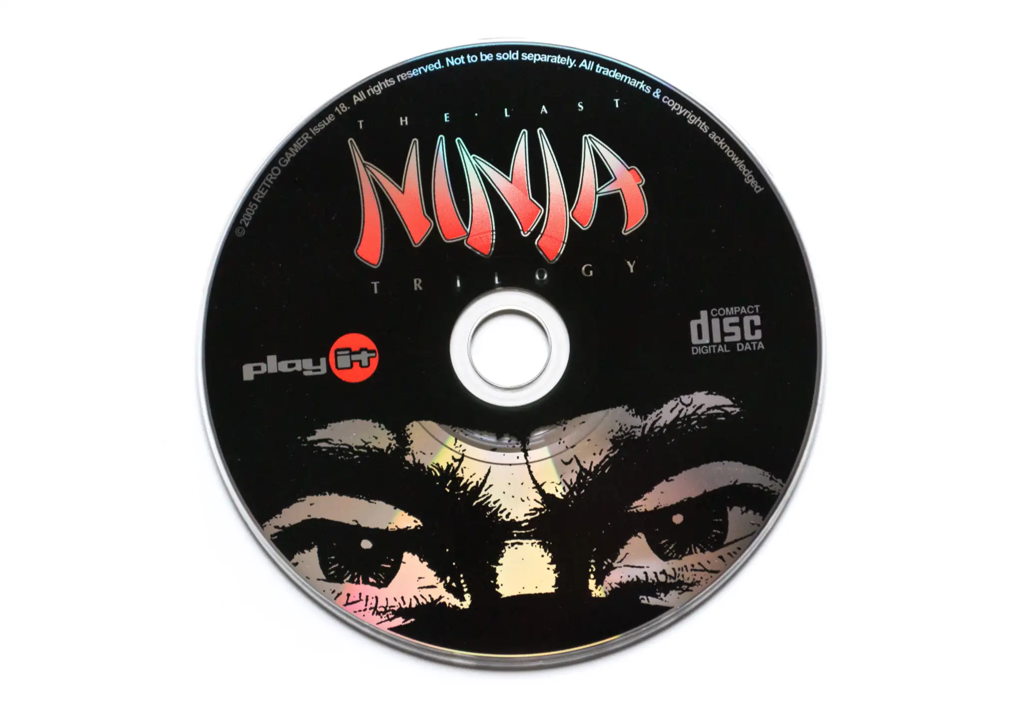 Photo of the content of The Last Ninja Trilogy (2005, C64, UK, Retro Gamer); developed by System 3 Software Ltd., published by live Publishing International Ltd; Hi-res 3D box available at https://bigboxcollection.com