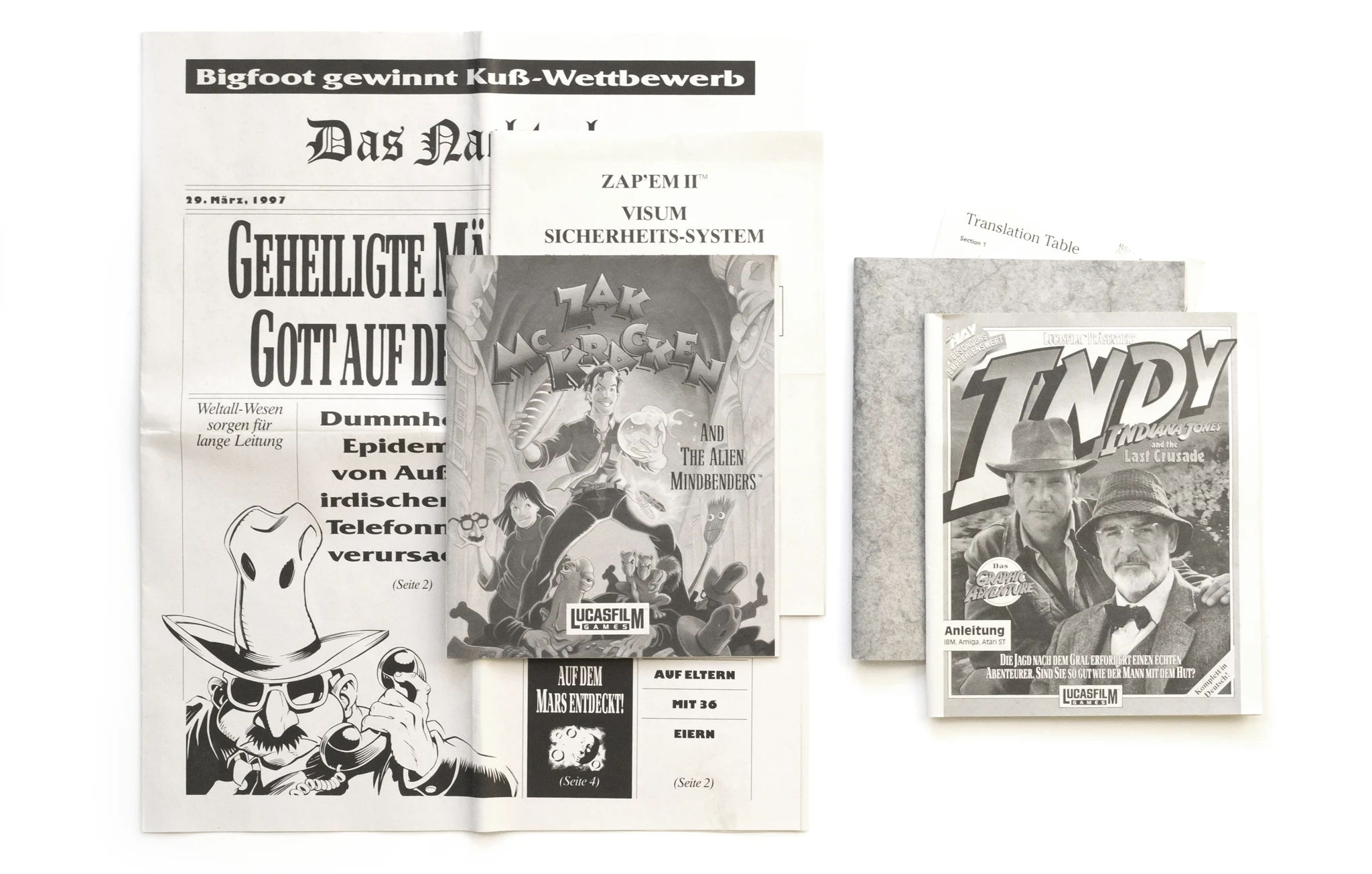 Another photo of the content of LucsArts Classic Adventures (1993, PC, DE) Another photo of the content of LucsArts Classic Adventures (1993, PC, DE); developed by LucasArts Entertainment Company LLC, published by Softgold Computerspiele GmbH; Hi-res 3D box available at https://bigboxcollection.com
