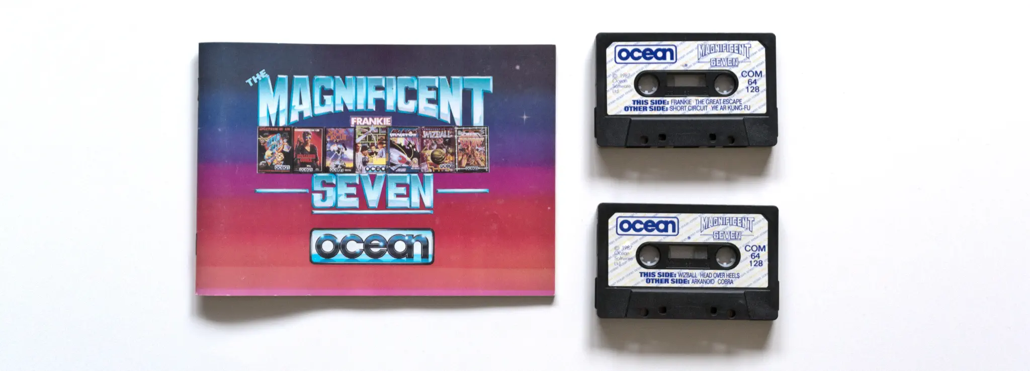 Photo of the content of The Magnificent Seven (1987, C64, UK, Compilation) Photo of the content of The Magnificent Seven (1987, C64, UK, Compilation); developed by Various, published by Ocean Software Ltd.; Hi-res 3D box available at https://bigboxcollection.com
