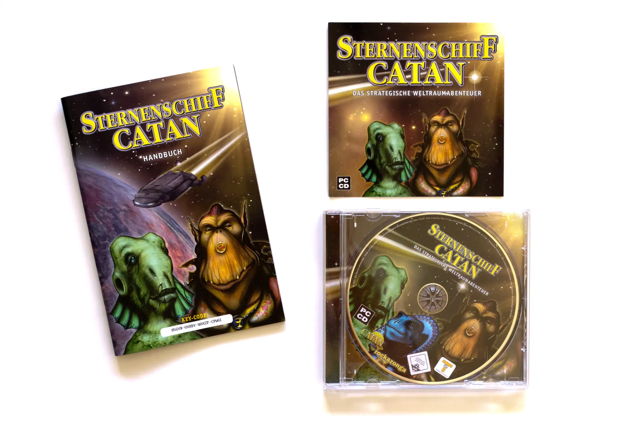 Photo of the content of Sternenschiff Catan (2003, PC, DE) Photo of the content of Sternenschiff Catan (2003, PC, DE); developed by Rockazonga, published by Take-Two Interactive Software, Inc.; Hi-res 3D box available at https://bigboxcollection.com