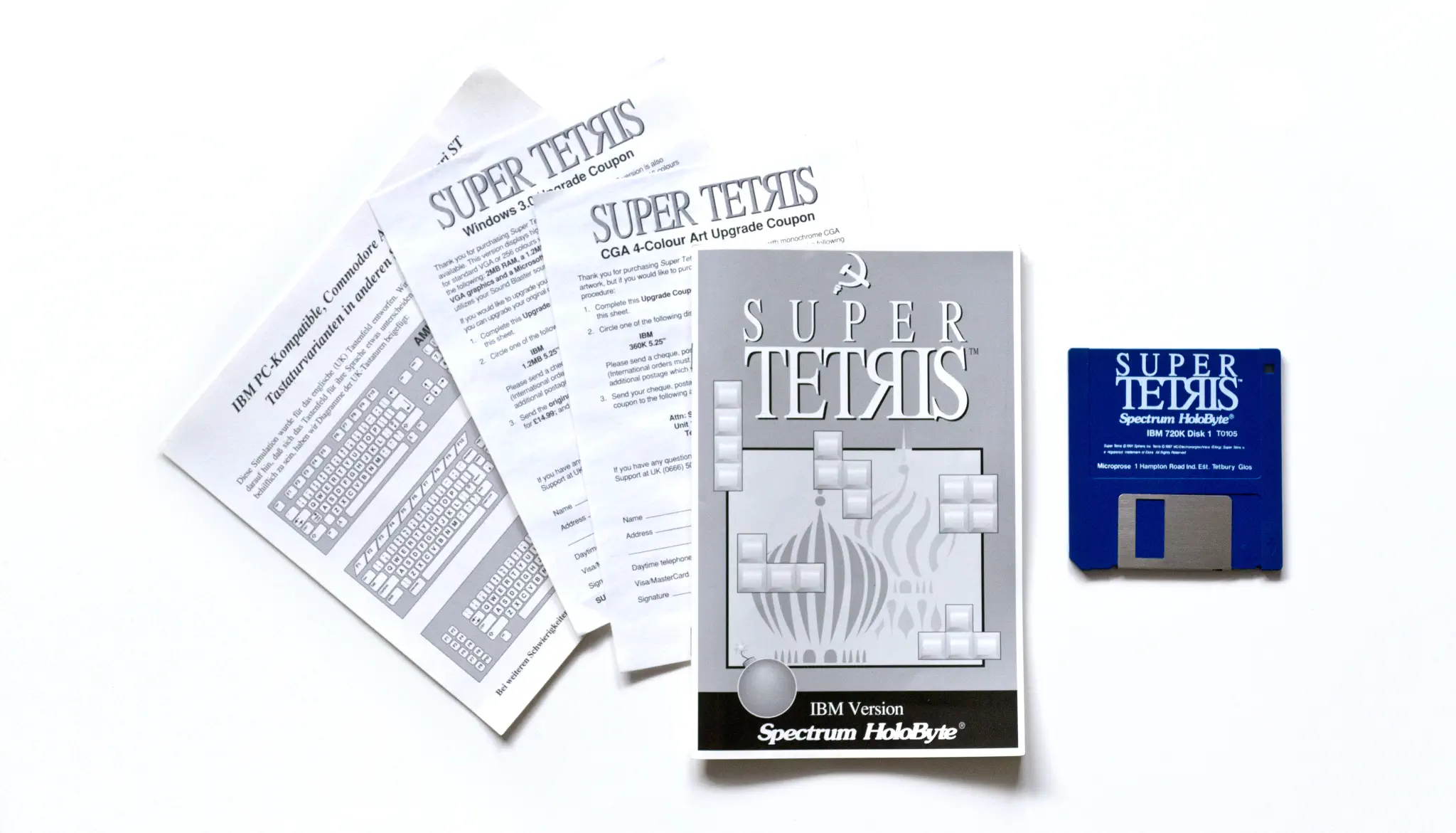 Photo of the content of Super Tetris (1991, PC, DE); developed by Sphere, Inc., published by Spectrum Holobyte, Inc.; Hi-res 3D box available at https://bigboxcollection.com