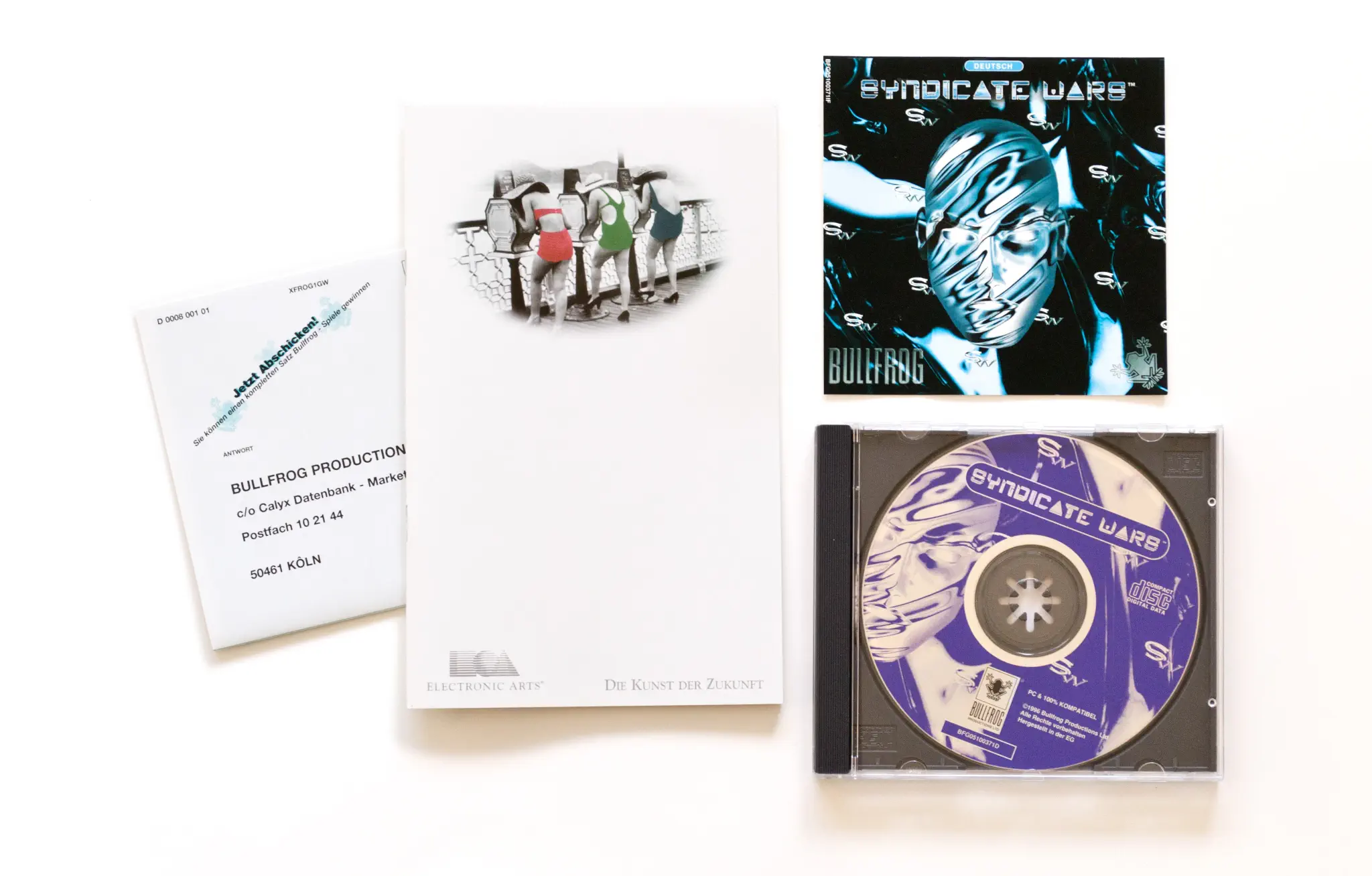 Photo of the content of Syndicate Wars (1996, PC, DE) Photo of the content of Syndicate Wars (1996, PC, DE); developed by Bullfrog Productions, Ltd., published by Electronic Arts, Inc.; Hi-res 3D box available at https://bigboxcollection.com