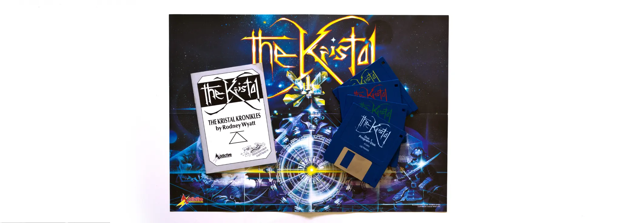 Photo of the content of The Kristal (1989, Atari ST, EU) Photo of the content of The Kristal (1989, Atari ST, EU); developed by Fissionchip Software, published by Addictive Games Ltd; Hi-res 3D box available at https://bigboxcollection.com
