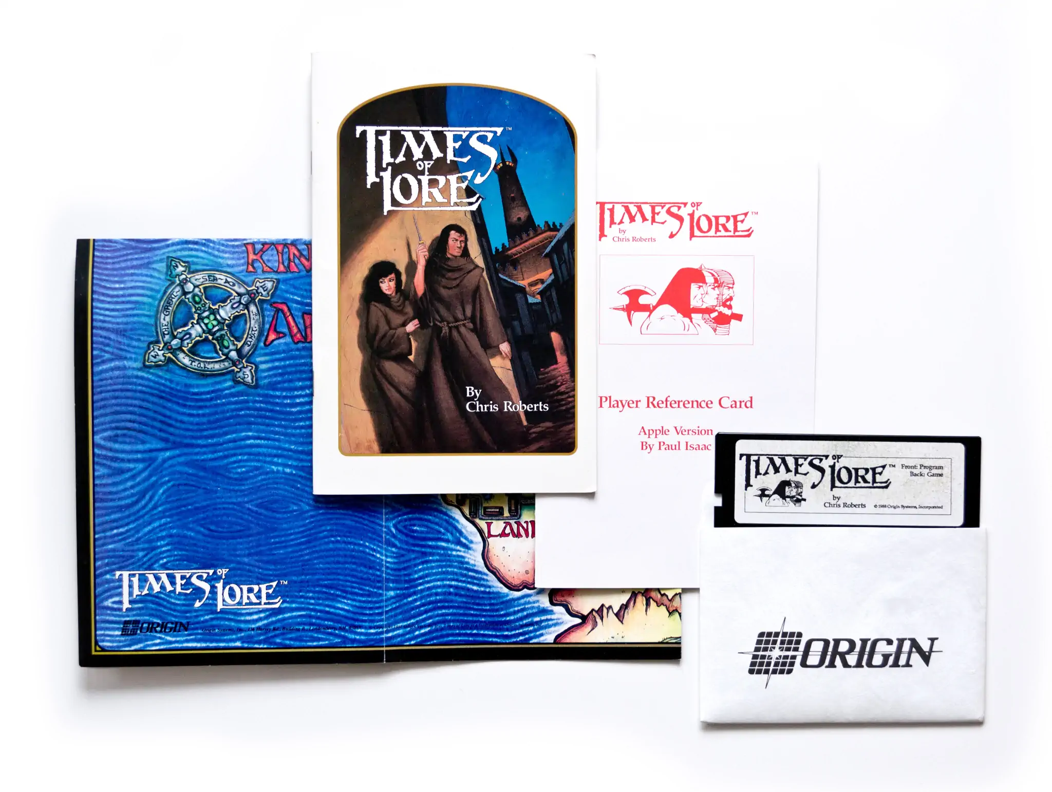 Photo of the content of Times of Lore (1988, Apple ][, US); developed by ORIGIN Systems, Inc., published by ORIGIN Systems, Inc.; Hi-res 3D box available at https://bigboxcollection.com