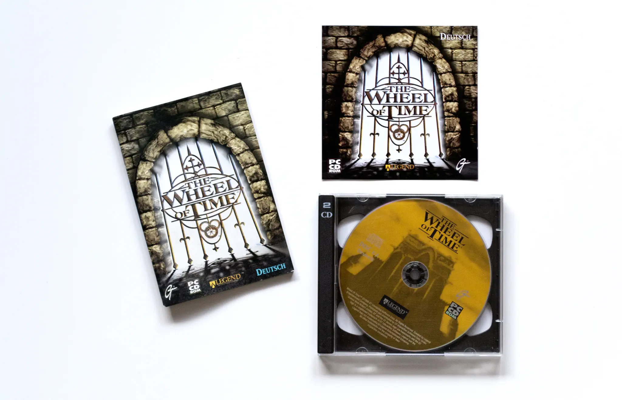 Photo of the content of The Wheel of Time (1999, PC, DE) Photo of the content of The Wheel of Time (1999, PC, DE); developed by Legend Entertainment Company, published by GT Interactive Software Corp.; Hi-res 3D box available at https://bigboxcollection.com