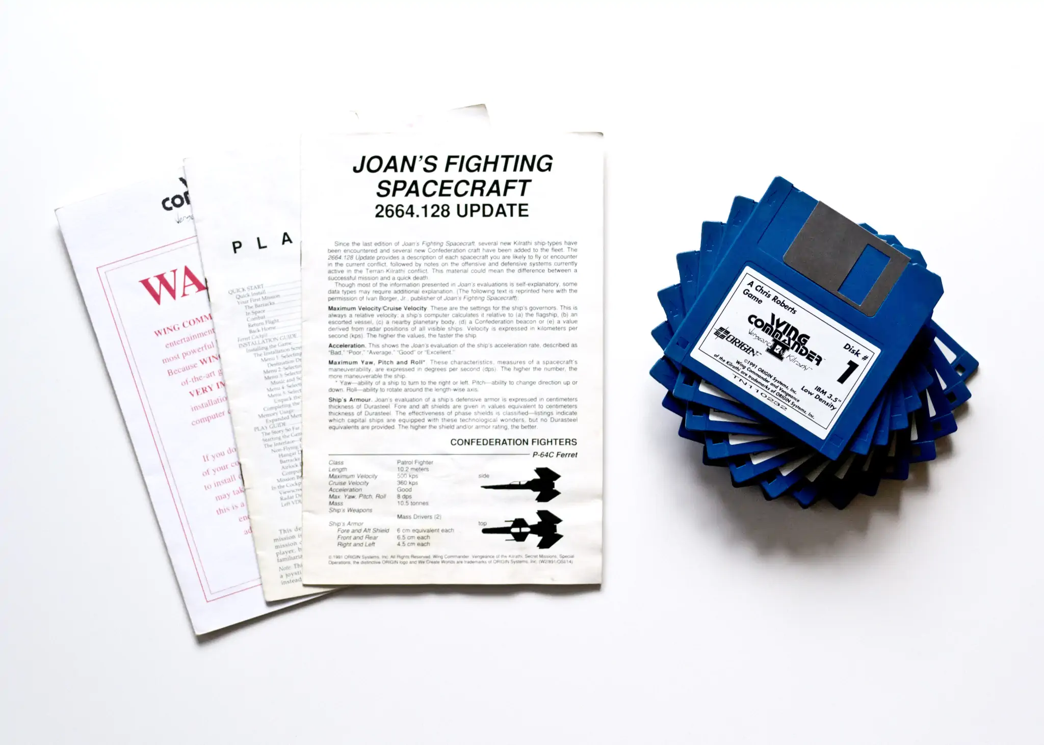 Photo of the content of Wing Commander II: Vengeance of the Kilrathi (1991, PC, EU) Photo of the content of Wing Commander II: Vengeance of the Kilrathi (1991, PC, EU); developed by ORIGIN Systems, Inc., published by ORIGIN Systems, Inc.; Hi-res 3D box available at https://bigboxcollection.com
